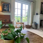 Manor House Overlooking Fields And Garden