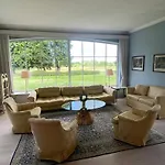 Manor House Overlooking Fields And Garden