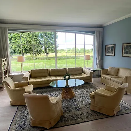 Manor House Overlooking Fields And Garden